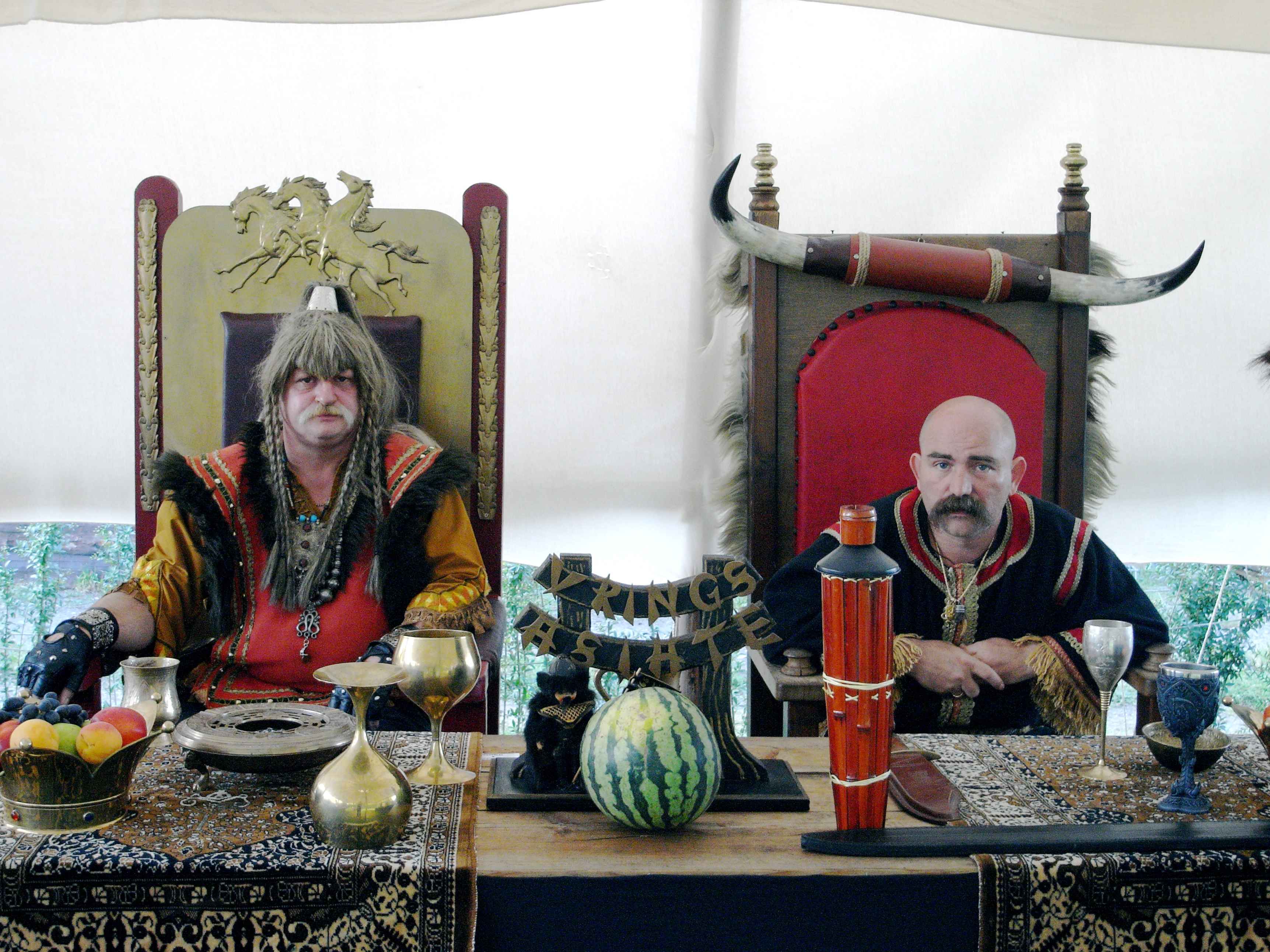 King Rugula (left) and King Mundzuk (right) of the Hun Tribe “Vrings Asiaten” at their summer camp. The two characters are played by taxi driver Jürgen Piefer and DJ Adi Rath respectively. Photo: © Anja Dreschke 2007. Used with permission.