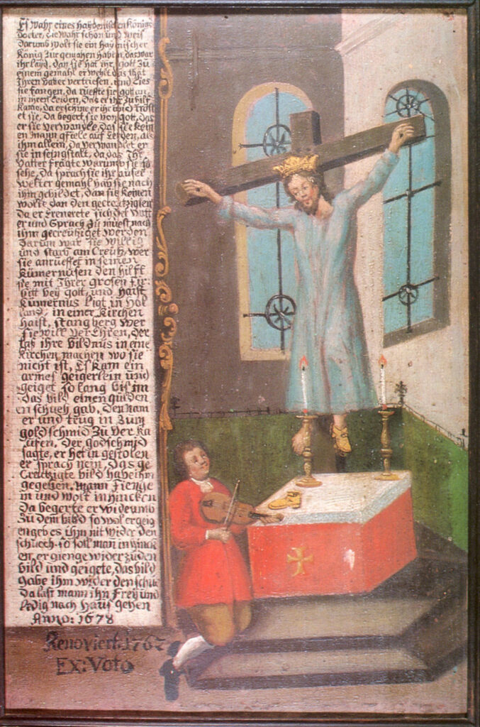 Panel of St Wilgefortis on a cross.